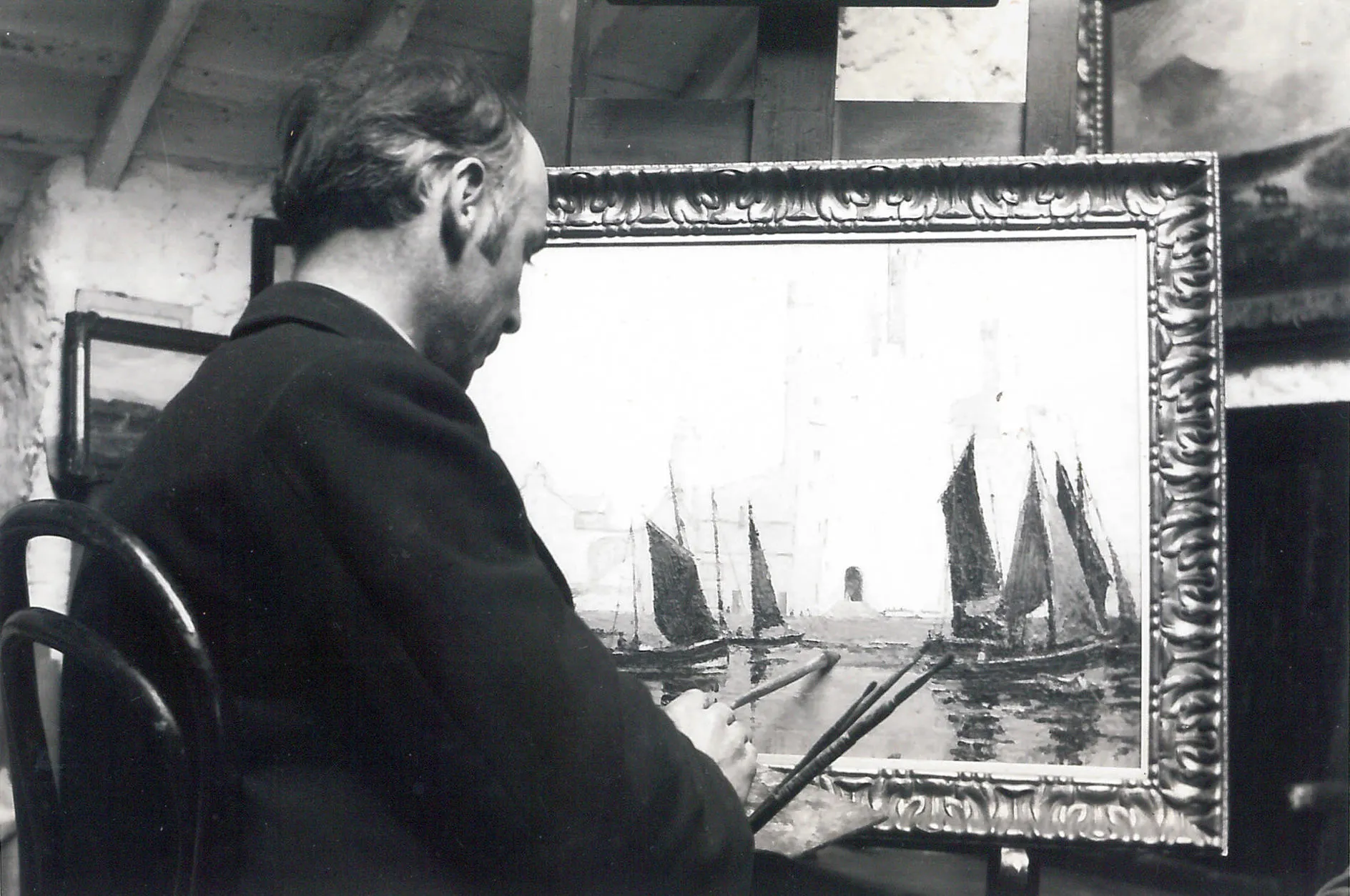 Harry Hughes Willliams painting in his studio