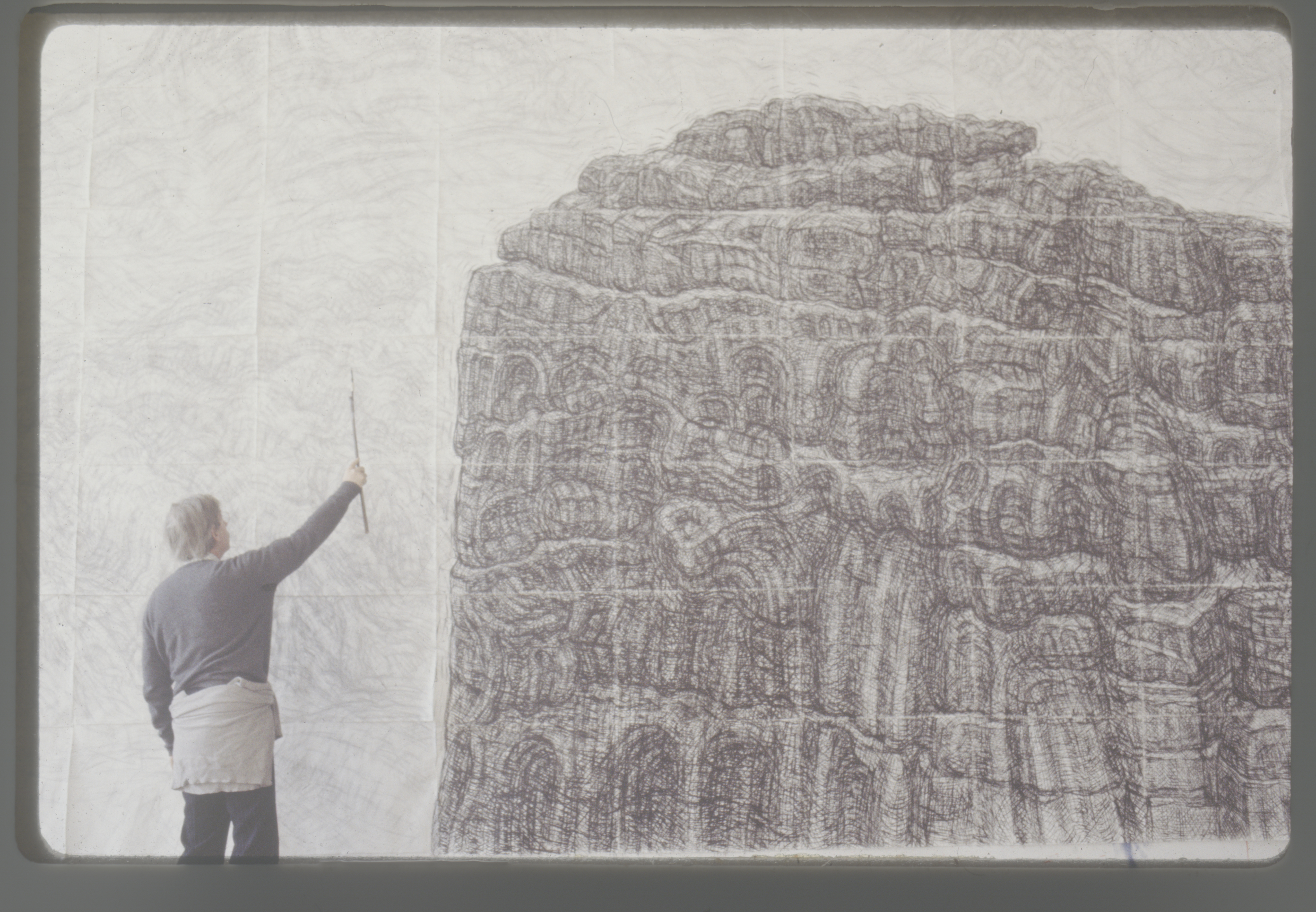 Leonard measuring the drawing Rock and Sea Anglesey.